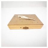 Vintage Gold-Tone Vanity Compact with Mirror, Amber-Toned Base, and Rhinestone Brooch