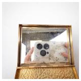 Vintage Gold-Tone Vanity Compact with Mirror, Amber-Toned Base, and Rhinestone Brooch