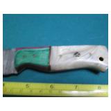 Hand crafted Damascus knife with le...