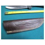 Hand crafted Damascus knife with le...