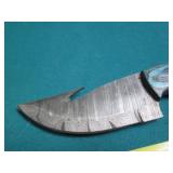 Hand crafted Damascus knife with le...