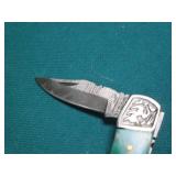 Hand crafted Damascus knife with le...