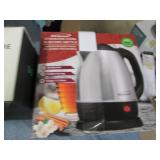 Set of 4 mugs and a coffee maker...