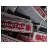 Large box of assorted playing cards...