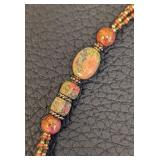 20-Inch Beaded Stone Necklace with Carved Leaf Pendant