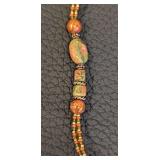 20-Inch Beaded Stone Necklace with Carved Leaf Pendant