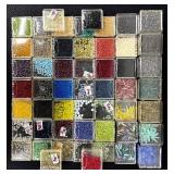 W - Collection of Assorted Glass Beads in Various Colors and Sizes