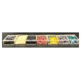 W - Collection of Assorted Glass Beads in Various Colors and Sizes