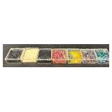 W - Collection of Assorted Glass Beads in Various Colors and Sizes