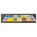 W - Collection of Assorted Glass Beads in Various Colors and Sizes