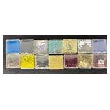 W - Collection of Assorted Glass Beads in Various Colors and Sizes