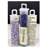 W - Collection of 52 Small Glass Bead Tubes Assorted Colors