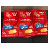 3 Display Cases Of Dolly Golden Creme Cakes