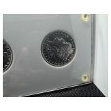 Six Uncirculated New Orleans Mint Morgan Dollars in a Capital Holder: 1898-O; 1899-O; 1900-O; 1901-O; 1902-O; and 1904-O - Beautiful Coins - Extreme Mint Luster!