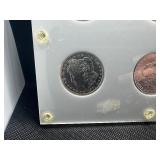 Six Uncirculated New Orleans Mint Morgan Dollars in a Capital Holder: 1898-O; 1899-O; 1900-O; 1901-O; 1902-O; and 1904-O - Beautiful Coins - Extreme Mint Luster!