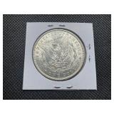 1886 Morgan Silver Dollar Marked MS64 When Purchased