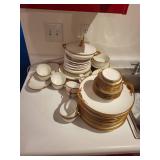 Antique Porcelain Dinnerware Set with Gold Trim and Serving Pieces