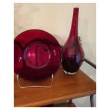 Collection of Red Art Glass Decor Pieces with Plates, Vases, and Candle Holder