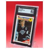1991-92 Topps Hockey Wayne Gretzky Highlights Card #524 Near Mint-Mint SGC 8