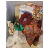 Collection of Holiday and Christmas Decor with Wreaths, Garlands, and Village Pieces