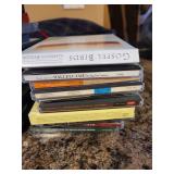 Group of Assorted DVDs and Music CDs