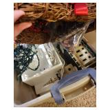 Collection of Holiday and Christmas Decor with Wreaths, Garlands, and Village Pieces