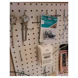 Assorted Craft Supplies Lot with Pegboard Hooks, Wire Forms, and Tools