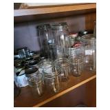 Collection of Canning Jars, Lids, and Graniteware Pot