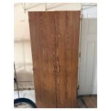 Tall Wood-Grain Cabinet with Double Doors - Shelved Interior