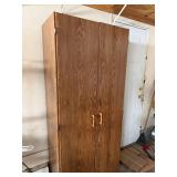 Tall Wood-Grain Cabinet with Double Doors - Shelved Interior