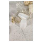 Lot of Various Plastic Containers and Bath Accessories such as clear cups, lids, loofahs, and bath sponges