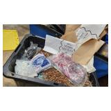 Decorative shreds, tissue paper and packing materials in a container