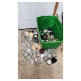 Collection of Used Glass Jars and Candle Holders