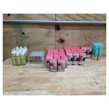 Bin of Milani and Wet and Wild beauty items