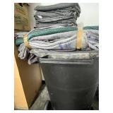 Group of Moving Blankets, Used U-Haul Boxes, and Packing Materials & Large Trash Bin