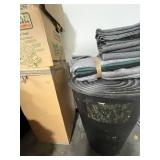 Group of Moving Blankets, Used U-Haul Boxes, and Packing Materials & Large Trash Bin