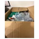 Group of Moving Blankets, Used U-Haul Boxes, and Packing Materials & Large Trash Bin