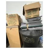 Group of Moving Blankets, Used U-Haul Boxes, and Packing Materials & Large Trash Bin