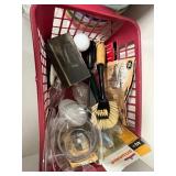 Tall White Storage Cabinet with Assorted Household Supplies