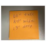 Tall White Storage Cabinet with Assorted Household Supplies