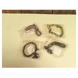 Bracelets  - (green, purple, black, silver)