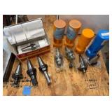 CNC CV40 assorted tool holders for milling; many appear to be new