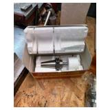 CNC CV40 assorted tool holders for milling; many appear to be new