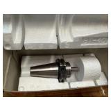 CNC CV40 assorted tool holders for milling; many appear to be new