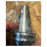 CNC CV40 assorted tool holders for milling; many appear to be new