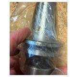 CNC CV40 assorted tool holders for milling; many appear to be new