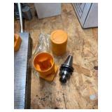 CNC CV40 assorted tool holders for milling; many appear to be new