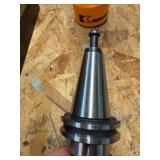 CNC CV40 assorted tool holders for milling; many appear to be new