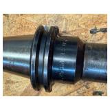 CNC CV40 assorted tool holders for milling; many appear to be new