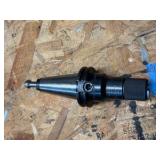 CNC CV40 assorted tool holders for milling; many appear to be new